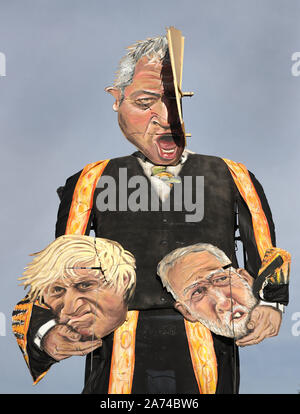 The repaired effigy of Speaker John Bercow, holding the heads of Prime Minister Boris Johnson and Labour party leader Jeremy Corbyn, by the Edenbridge Bonfire Society at Breezehurst Farm Industrial Park, which will be burned at an annual bonfire celebration in Edenbridge, Kent. Stock Photo