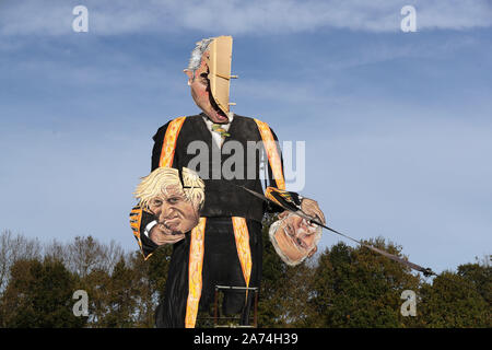 The repaired effigy of Speaker John Bercow, holding the heads of Prime Minister Boris Johnson and Labour party leader Jeremy Corbyn, by the Edenbridge Bonfire Society at Breezehurst Farm Industrial Park, which will be burned at an annual bonfire celebration in Edenbridge, Kent. PA Photo. Picture date: Wednesday October 30, 2019. Photo credit should read: Gareth Fuller/PA Wire Stock Photo