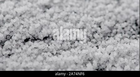 White little polystyrene foam balls as background Stock Photo - Alamy