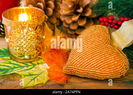 Autumn decoration with burning candle Stock Photo