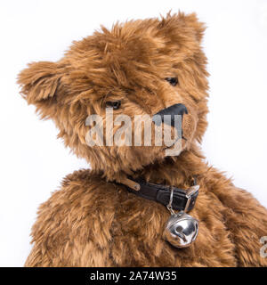 Vintage teddy bear on plain white background Stock Photo