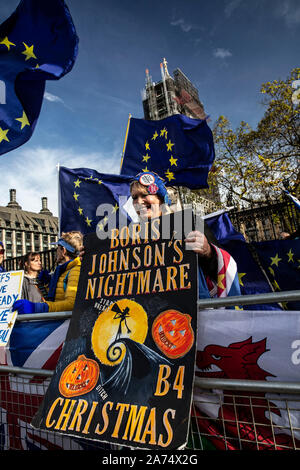 London, UK. 30th Oct, 2019. Anti Brexit Protesters outside Houses of Parliament, Westminster, UK 30th October 2019 Pro EU demonstartors with Halloween placards against UK Prime Minister Boris Johnson and the upcoming UK election. Credit: Clickpics/Alamy Live News Stock Photo