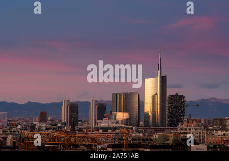 Milan (Italy) skyline at sunset with modern skyscrapers in Porta Nuova business district. Stock Photo