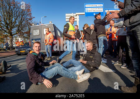 THE HAGUE, Malieveld, 30-10-2019, Construction- and infrastructure entrepreneurs, dredgers and landscapers are protesting against the government's nitrogen policy and the PFAS standard on Wednesday. On Tuesday the Ministry of Infrastructure announced that it wants to ease the measures around PFAS by December 1st. And the government is expected to announce emergency measures around nitrogen emissions today. But the construction sector worries that these measures will be too late to save their businesses from bankruptcy. Stock Photo