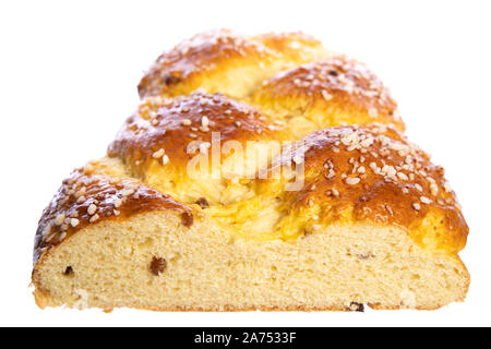 Typical traditional Austria:  cutted fresh Allerheiligen Striezel with raising isolated on white background Stock Photo