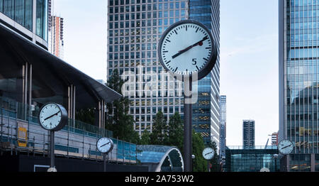 Canary Wharf, London, United Kingdom 2nd August 2019: Clocks at Canary Wharf, London financial centre Stock Photo
