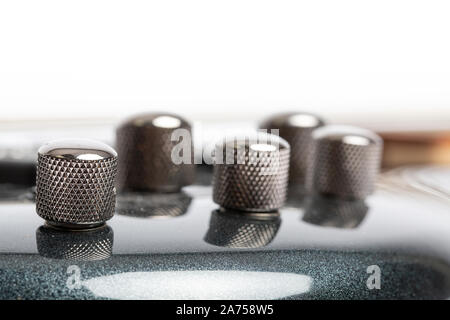 Volume and Tone controls on a modern bass guitar Stock Photo