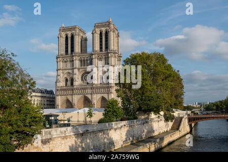The cathedral of Notre Dame de Paris after the devastating fire of April, 2019 blocked off for tourists due to restoration works. Stock Photo
