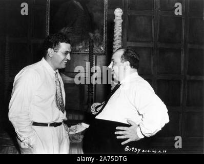 Producer DAVID O. SELZNICK and Director ALFRED HITCHCOCK on set candid during filming of REBECCA 1940 novel Daphne Du Maurier Selznick International Pictures / United Artists Stock Photo