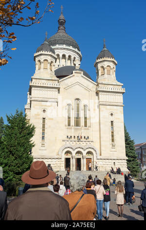 Cluj Napoca, Romania - 27 Oct, 2019: People attend the sunday mass outside the The Dormition of the Theotokos Cathedral in Cluj Napoca, Romania. Stock Photo