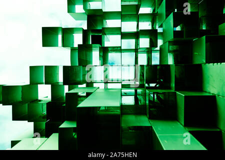 long green metal squares welded together pointing up at the sky Stock Photo