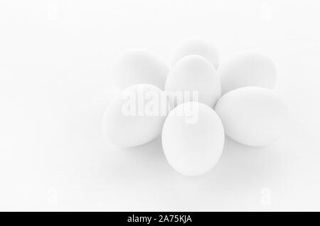 fresh white eggs on white background, closeup Stock Photo