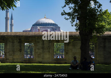 Istanbul: Hagia Sophia, former Greek Orthodox Christian patriarchal cathedral, later Ottoman imperial mosque, through the courtyard of the Blue Mosque Stock Photo