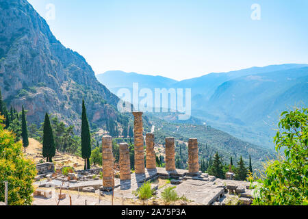 Delphi Greece - July 28 2019; Ancient city of Delphi remains of columns and ruins and diggings with pillars and structures dating back to BC era in vi Stock Photo