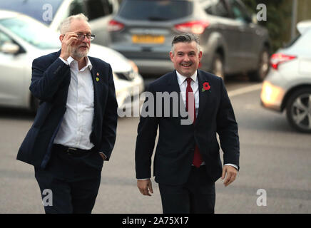 Labour leader Jeremy Corbyn (left) and Shadow Health Secretary Jon Ashworth arrives for a visit to Crawley Hospital, Crawley, West Sussex, to talk about his party's NHS plans. PA Photo. Picture date: Wednesday October 30, 2019. Photo credit should read: Andrew Matthews/PA Wire Stock Photo