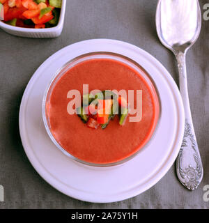 Andalusian gazpacho, Spanish tomato soup made from made of raw blended vegetables and perfect for hot summer. Healthy raw food background Stock Photo
