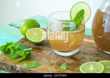 Food photography of tamarind water in a glass with lime and mint Stock Photo