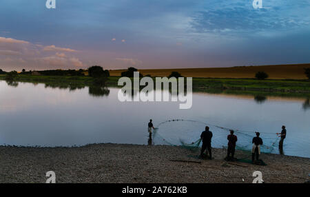 Salmon fishermen on the River Tweed at Paxton House fishery Stock Photo