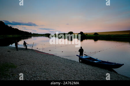 Salmon fishermen on the River Tweed at Paxton House fishery Stock Photo