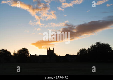 St Edward's Church in Stow on the Wold at sunrise in the autumn. Silhouette. Stow on the Wold, Cotswolds, Gloucestershire, England Stock Photo