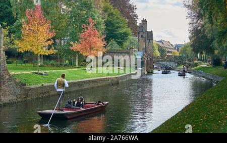 Sunlit garden next to the river Cam at Queens' college, university of Cambridge, England, on an autumn day. Stock Photo
