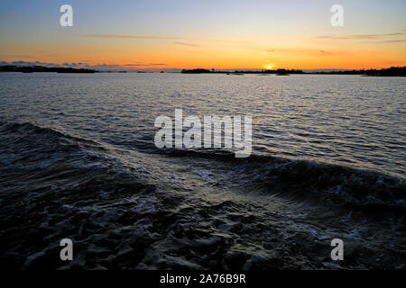 Late October sunset with some clouds over Gulf of Finland. Stock Photo