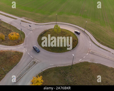 Aerial view of roundabout traffic with cars Stock Photo - Alamy