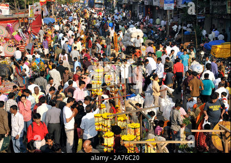 Mumbai; Maharashtra; India, Southeast Asia - Oct. 25; 2011: People shopping for Diwali Festival Crowd on road at Dadar Market Near railway station. Stock Photo