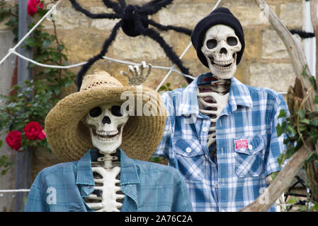 decorated house for Halloween in the cotswolds, Skeletons go Camping Stock Photo