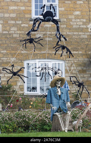 decorated house for Halloween in the cotswolds, Skeletons go Camping Stock Photo