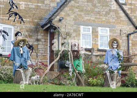 decorated house for Halloween in the cotswolds, Skeletons go Camping Stock Photo