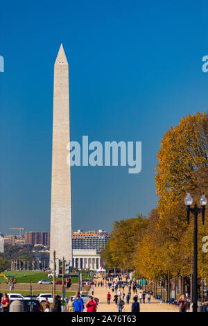 WASHINGTON, DC, USA - People walk on The National Mall. Washington Monument in distance. Stock Photo