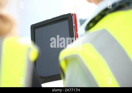 people at work with a table and papers Stock Photo