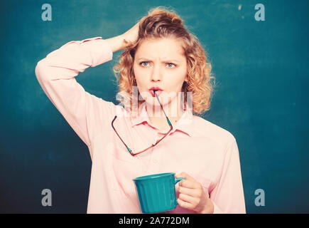 Fresh coffee. school teacher need coffee break. good morning. girl refreshing with tea drink. idea and inspiration. energy and vigor. energy charge. woman with coffee cup at blackboard. Stock Photo