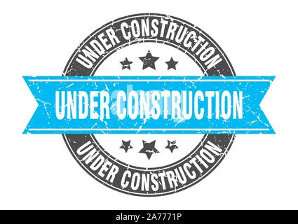 under construction round stamp with turquoise ribbon. under construction Stock Vector