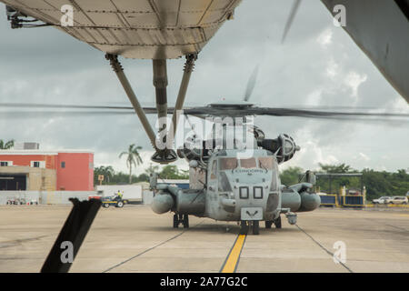 A CH-53E Super Stallion helicopter with Special Purpose Marine Air-Ground Task Force – Southern Command taxis on a flight line in Ladyville, Belize, Oct. 28, 2019. The task force will be conducting aerial refueling operations with KC-130J Hercules tanker aircraft with Marine Aerial Refueler Transport Squadron 234. The task force is conducting training and engineering projects hand-in-hand with partner nation military members in Latin America and the Caribbean during their deployment to the region, which coincides with hurricane season. (U.S. Marine Corps photo by Sgt. Stanley Moy) Stock Photo