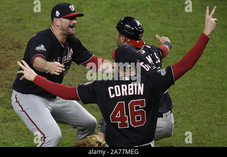 Washington Nationals relief pitcher Daniel Hudson and catcher Yan Gomes  celebrate after Game 7 of the baseball World Series against the Houston  Astros Wednesday, Oct. 30, 2019, in Houston. The Nationals won