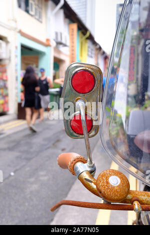 vintage bike closeup view on shopping street Stock Photo