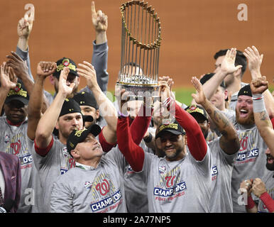 Houston, United States. 30th Oct, 2019. Washington Nationals General Manager Mike Rizzo (L) and manager Dave Martinez raise the Commissioners Trophy after the Nationals defeated the Houston Astros 6-2 to win the 2019 World Series at Minute Maid Park in Houston, Texas on Wednesday, October 30, 2019. This is the first World Series title in franchise history for the Nationals. Photo by Kevin Dietsch/UPI Credit: UPI/Alamy Live News Stock Photo