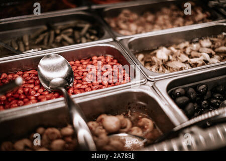 A salad bar with a variety of vegetables for wine at grocery store in america Stock Photo