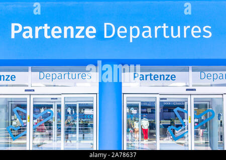 Trieste, Italy - 09-15-2019: Entrance of the Trieste Airport with the departure gates, security control, shops and luggage claim. Stock Photo