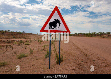 Elephant crossing warning road sign placed in the desert of Namibia Stock Photo