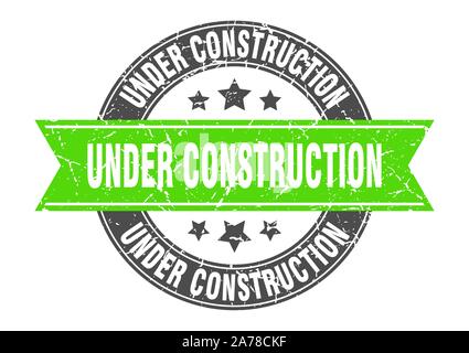 under construction round stamp with green ribbon. under construction Stock Vector