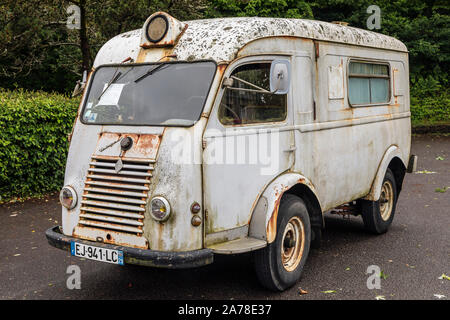 An old Renault Voltigeur campervan parked in Locronan, Brittany, France Stock Photo