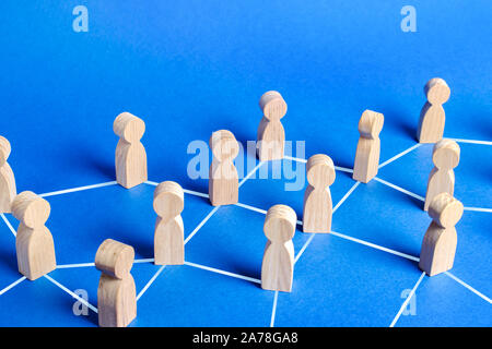 Figures of people connected by lines in a network. Communication and social networks. Cooperation and collaboration. Contact between participants, a t Stock Photo