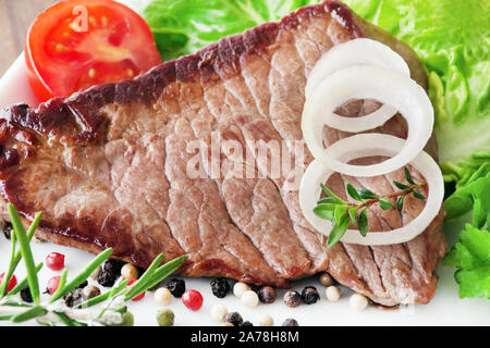 Beefsteak and salad Stock Photo