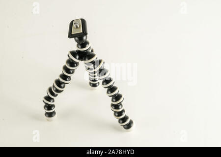 Mini table flexible tripod on white background Stock Photo