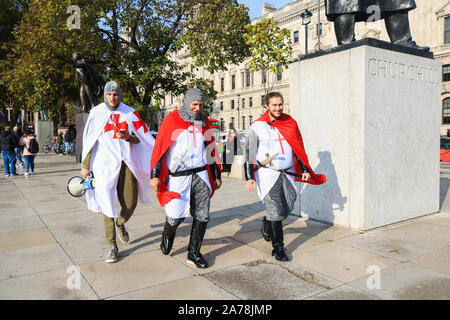London UK. 31 October 2019. Pro Brexit protesters dressed as crusaders protest  in Parliament Square on the day Brexit deadline passes when Britain was supposed to leave the European Union on 31 October. The EU has granted  Britain an extension until January 2012. amer ghazzal /Alamy live News Stock Photo