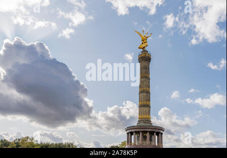 View of the Victory Column against a dramatic sky, Berlin, Germany