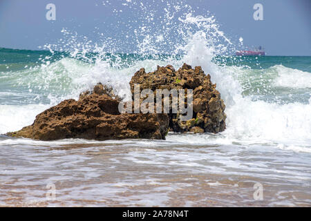 Sea waves crashing on stone formations on the shore of Ashkelon National Park. Israel Stock Photo